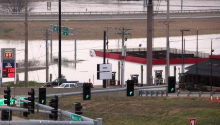 Flooded Phillips 66 gas station.