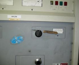 A steak knife on a control panel.