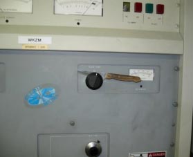 A steak knife on a control panel.