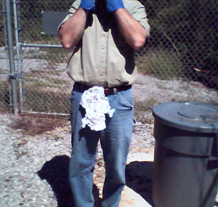Cautious contractor at a transmission site wearing a non-OSHA approved protector
