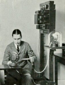 Radio announcer give in the grain report