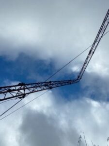 image of a broadcast tower that has collapsed due to rust damage due to faulty inspections